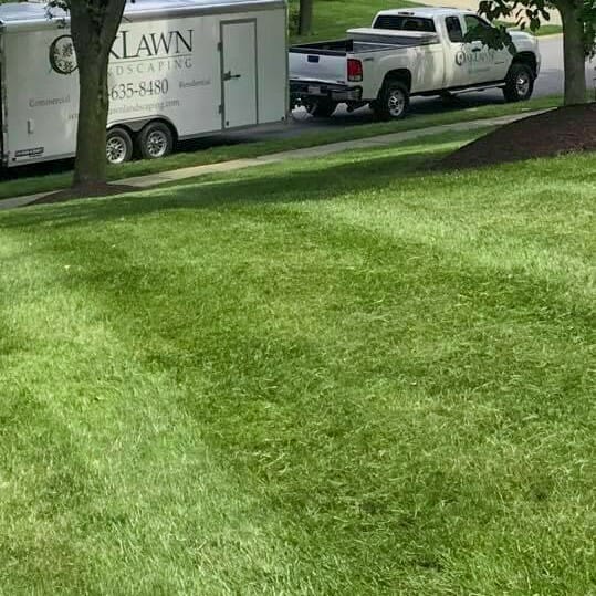 OakLawn Truck in front of fresh cut grass