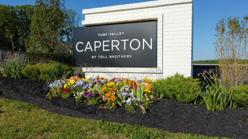 Landscape flowerbed at Turf Valley Caperton sign