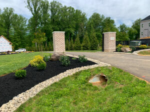 new landscaping at front of driveway