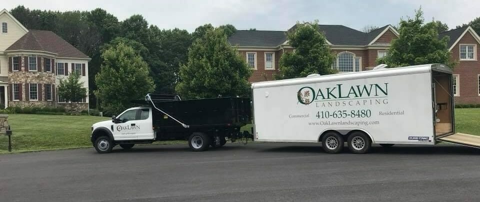 Oaklawn truck and trailer on job site
