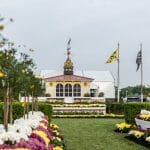 Winners Circle stage at The Preakness Stakes covered in flowers