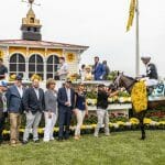 Horse and Jockey in winners circle at the Preakness Stakes