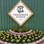 Preakness Stakes Sign with fresh planted and mulched flower bed
